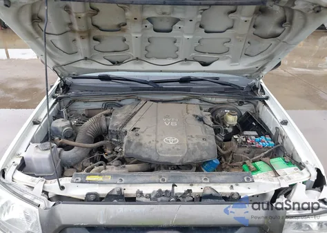 2014 Toyota Tacoma Base V6 z USA, uszkodzony, nr VIN 5TFMU4FN9EX025557